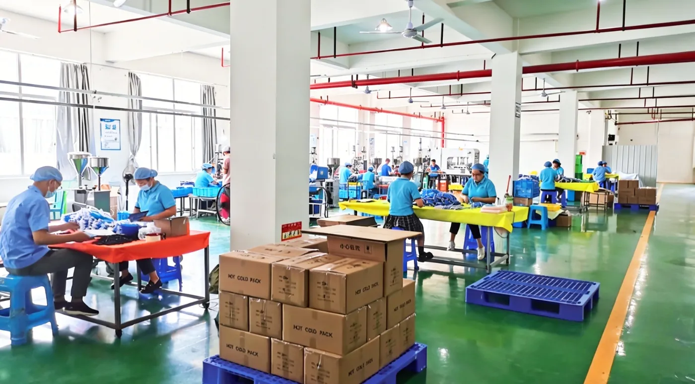 Professional manufacturing workshop for custom OEM gel pack orders with skilled workers and modern equipment.