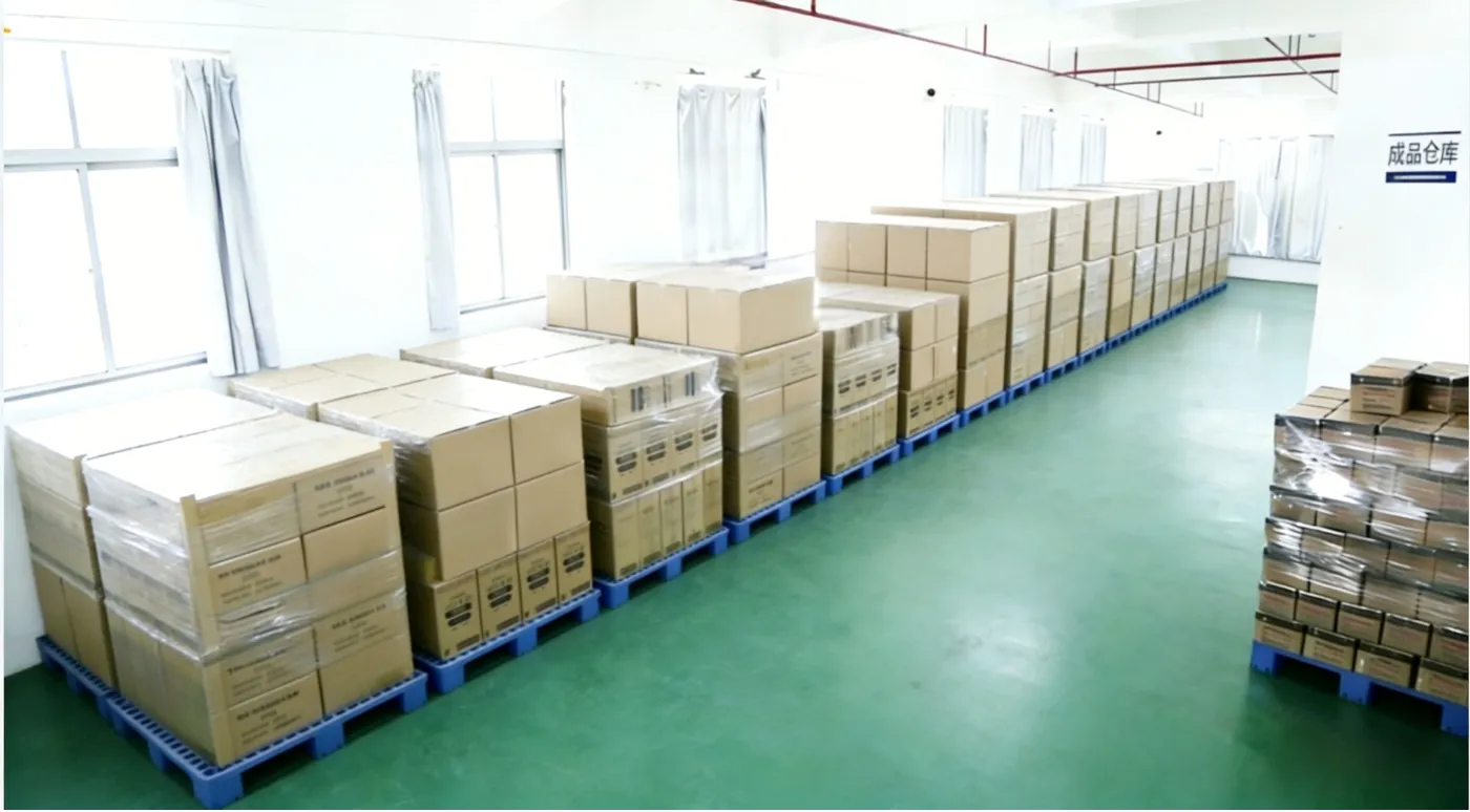 Neat finished goods warehouse storing bulk orders of hot and cold packs ready for global shipping.